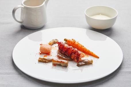 A plate of food on a table Description automatically generated