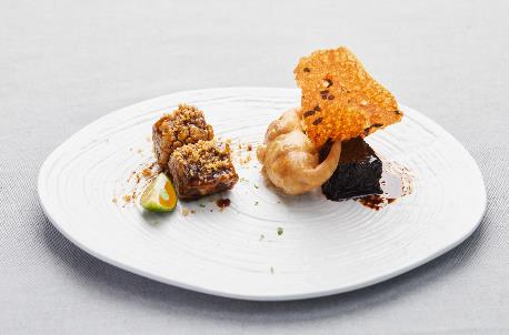 A plate of food on a table Description automatically generated