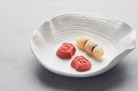 A plate with food on it Description automatically generated
