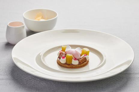 A plate with food on it Description automatically generated